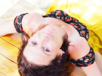 High angle portrait of woman relaxing at home