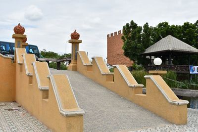 Steps leading to built structure against sky