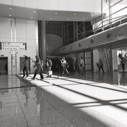 Group of people walking in airport