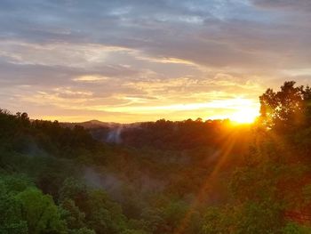Scenic view of landscape against sky during sunset