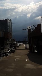 View of road against cloudy sky