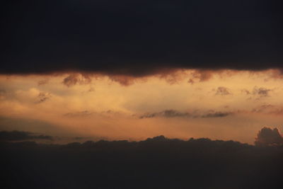 Scenic view of dramatic sky during sunset