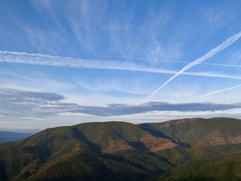 Scenic view of vapor trails against sky