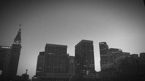 Low angle view of skyscrapers against sky