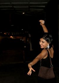 Woman dancing at nightclub