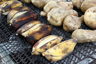 High angle view of meat on barbecue grill