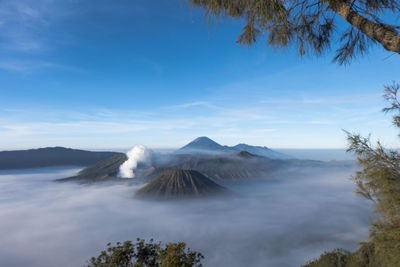 View of volcanic landscape against sky