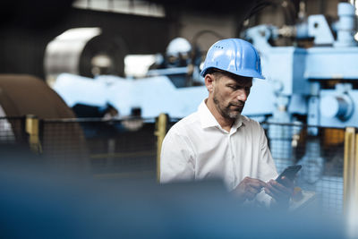 Man working with umbrella