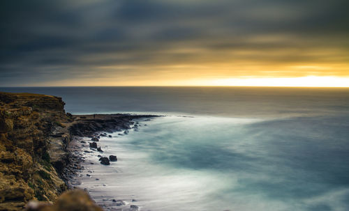 Scenic view of sea against sky during sunset