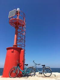 Bicycles against blue sky