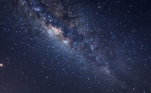 Low angle view of stars in sky at night