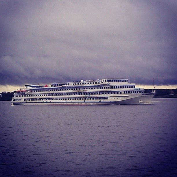 water, sky, architecture, waterfront, built structure, sea, cloud - sky, building exterior, cloudy, transportation, pier, cloud, nautical vessel, nature, dusk, outdoors, scenics, overcast, weather, tranquility