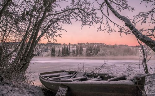 Scenic view of landscape against sky during winter