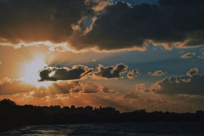 Scenic view of dramatic sky during sunset