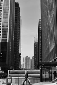 Low angle view of tall buildings against clear sky