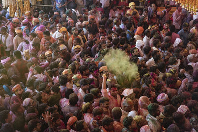 High angle view of people standing on street