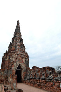 Old ruins of building against sky