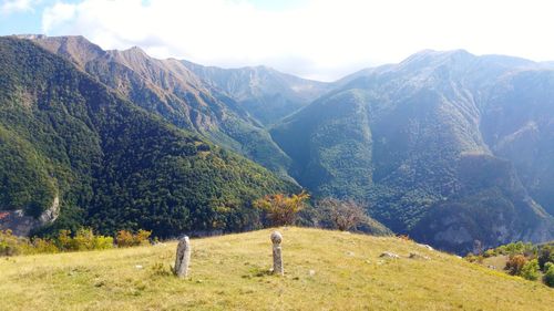 Scenic view of field against mountains