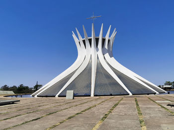 Low angle view of monument against clear blue sky