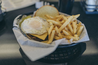 Close-up of burger with fries
