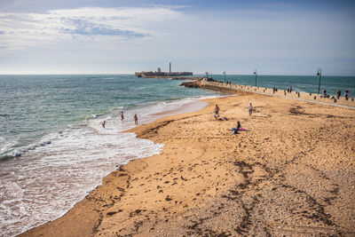 Scenic view of beach against sky