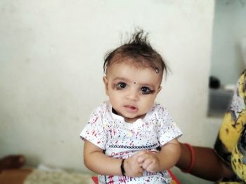 Portrait of cute girl at home