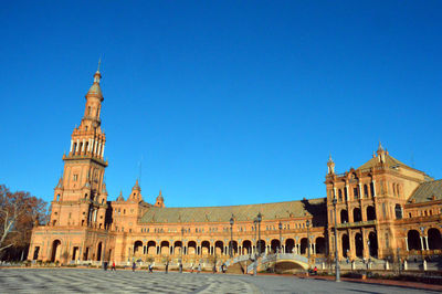 Low angle view of plaza de espana against clear sky