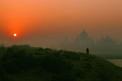 Scenic view of taj mahal against sky during sunset