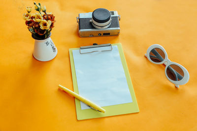 High angle view of smart phone on table