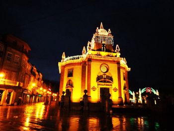 Illuminated building at night