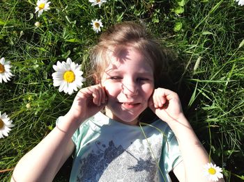 Portrait of a girl with pink flower