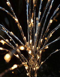 Low angle view of firework display at night