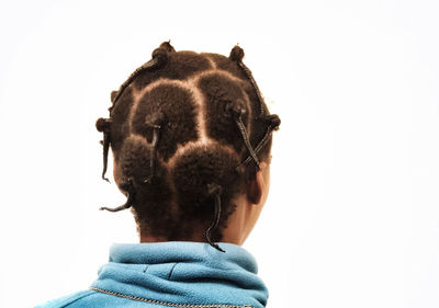 Rear view of man against white background