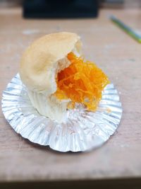 High angle view of ice cream in plate on table