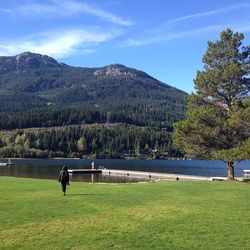 Scenic view of lake with mountains in background