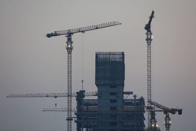 Low angle view of crane at construction site