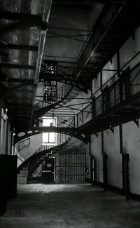 Empty alley along buildings