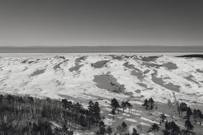 Scenic view of sea against sky during winter