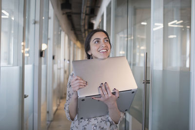 Young professional woman working on a laptop