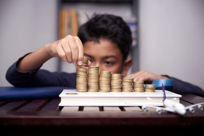 Portrait of a boy with stack