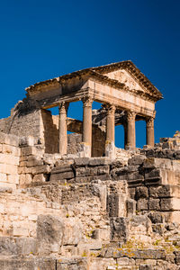 Old ruins against blue sky