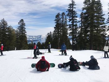 People in snow covered landscape