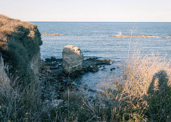 Scenic view of sea against clear sky