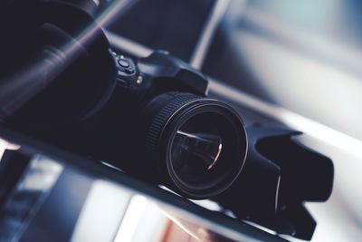 Close-up of cameras on table