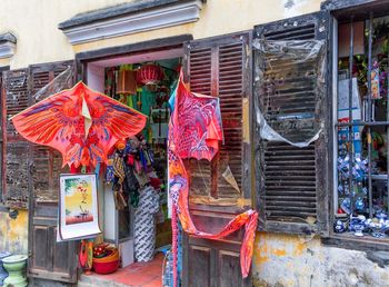 Multi colored decoration hanging in city