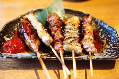 Close-up of meat on barbecue grill