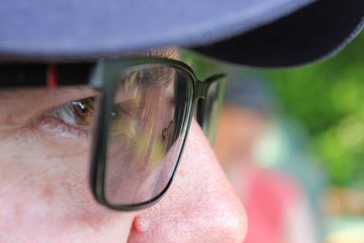 Close-up of man wearing eyeglasses