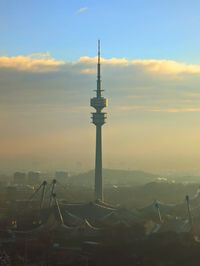 Scenic view of olympic tower against sky during sunrise