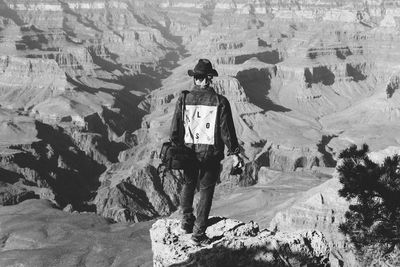 Man standing on rock