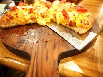 High angle view of bread on cutting board